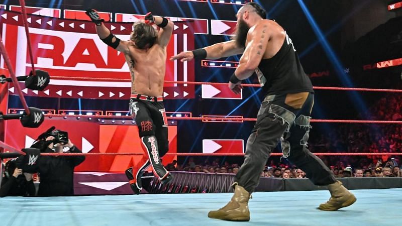 Strowman throwing Styles like a piece of paper